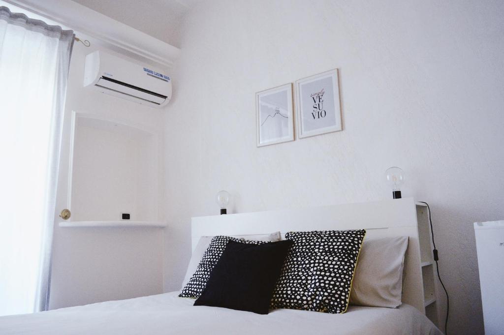 Letto o letti in una camera di Civico Vesuvio B&B