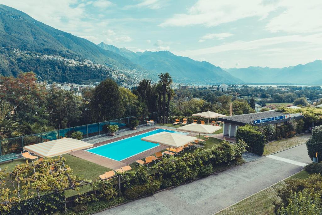 an aerial view of a house with a swimming pool at B&B Toblerina in Ascona