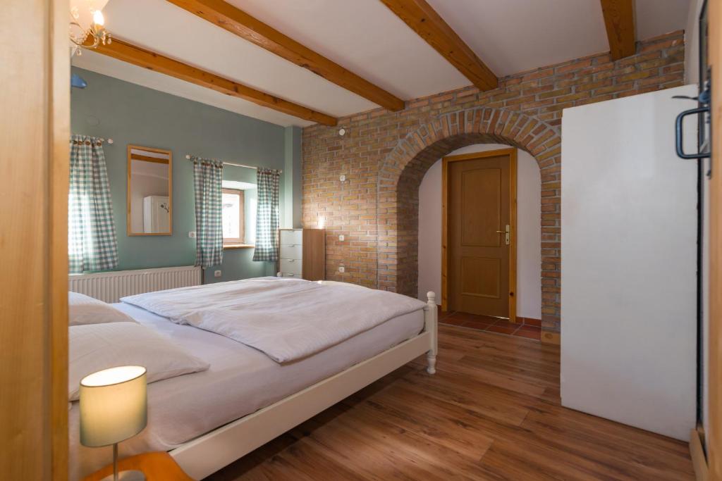 Postel nebo postele na pokoji v ubytování Chalet GoSlo