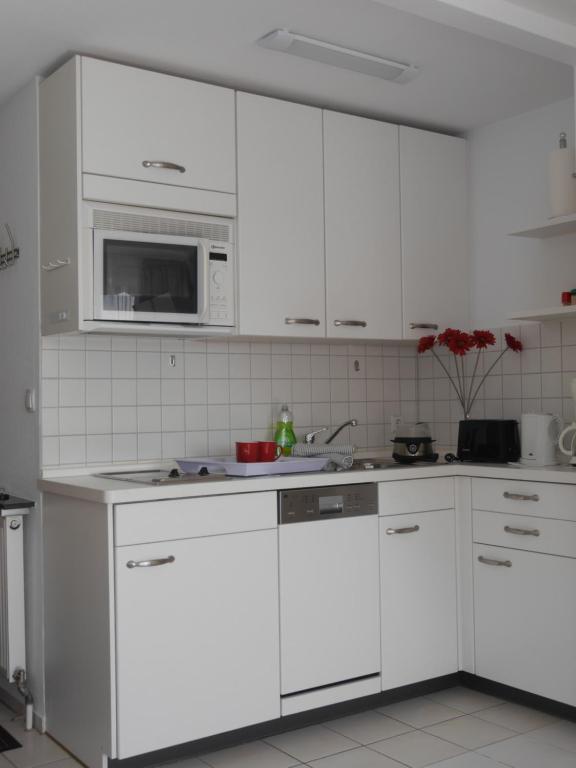 Kuchyň nebo kuchyňský kout v ubytování Appartement Allgäu-Sonne mit Sauna und Pool