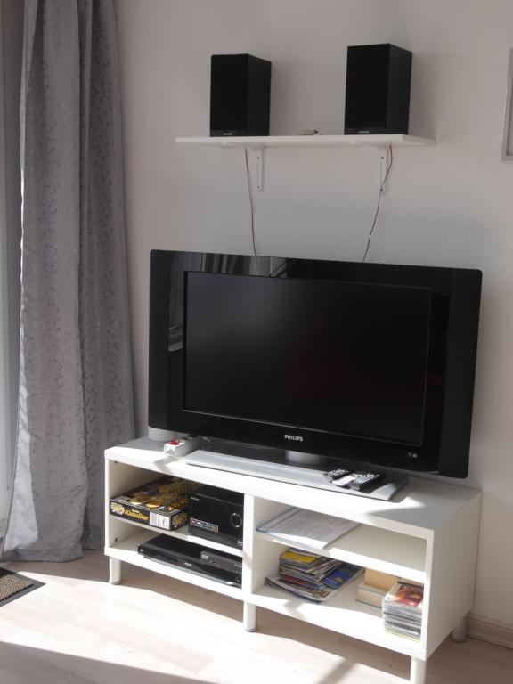TV a/nebo společenská místnost v ubytování Appartement Allgäu-Sonne mit Sauna und Pool