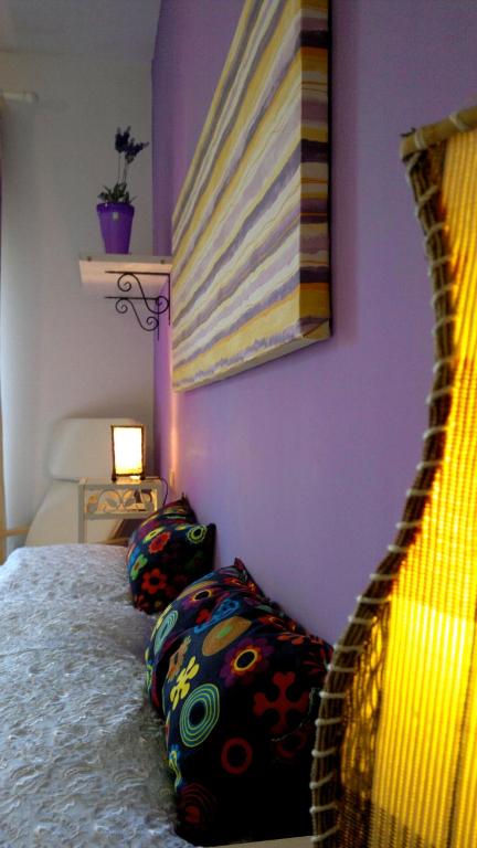 Łóżko lub łóżka w pokoju w obiekcie B&B Villa Maria Giovanna