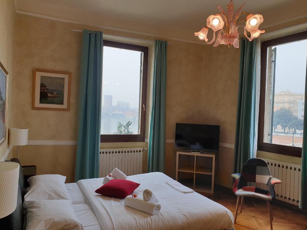 Postel nebo postele na pokoji v ubytování Lady Verona Residence