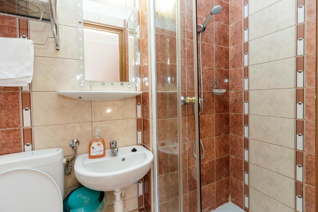 Kúpeľňa v ubytovaní Almafa Apartmanház