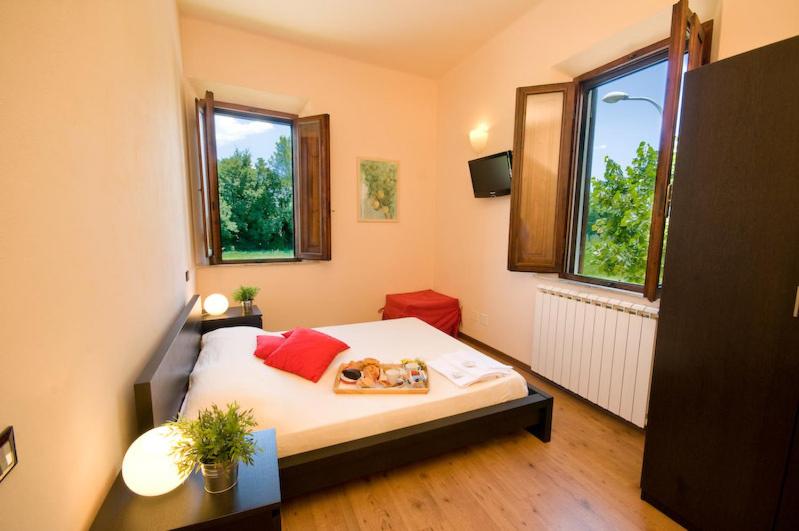 Postel nebo postele na pokoji v ubytování Dolce Notte