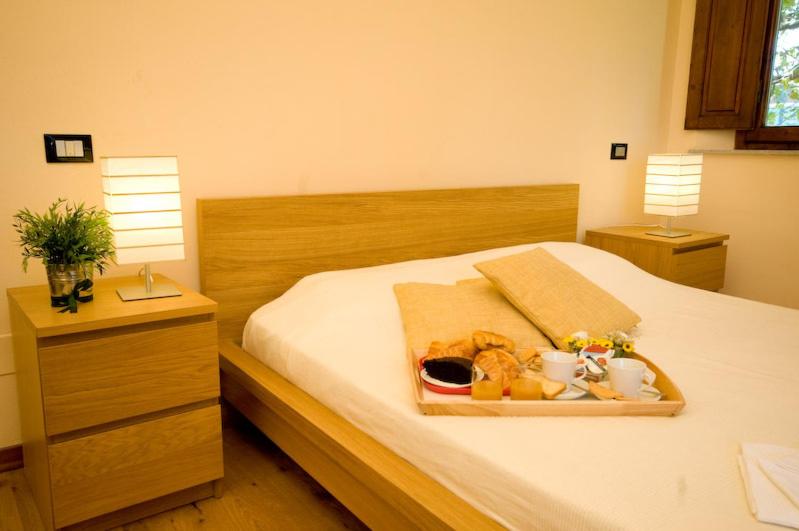 Postel nebo postele na pokoji v ubytování Dolce Notte