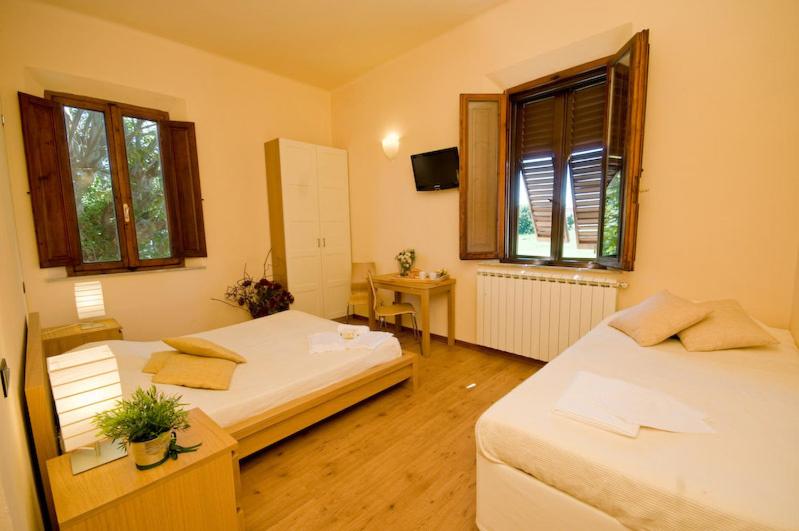 Postel nebo postele na pokoji v ubytování Dolce Notte