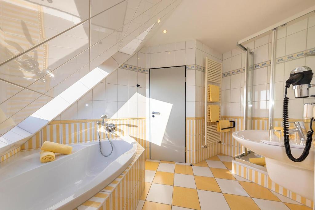 Koupelna v ubytování Dünenhotel am Meer