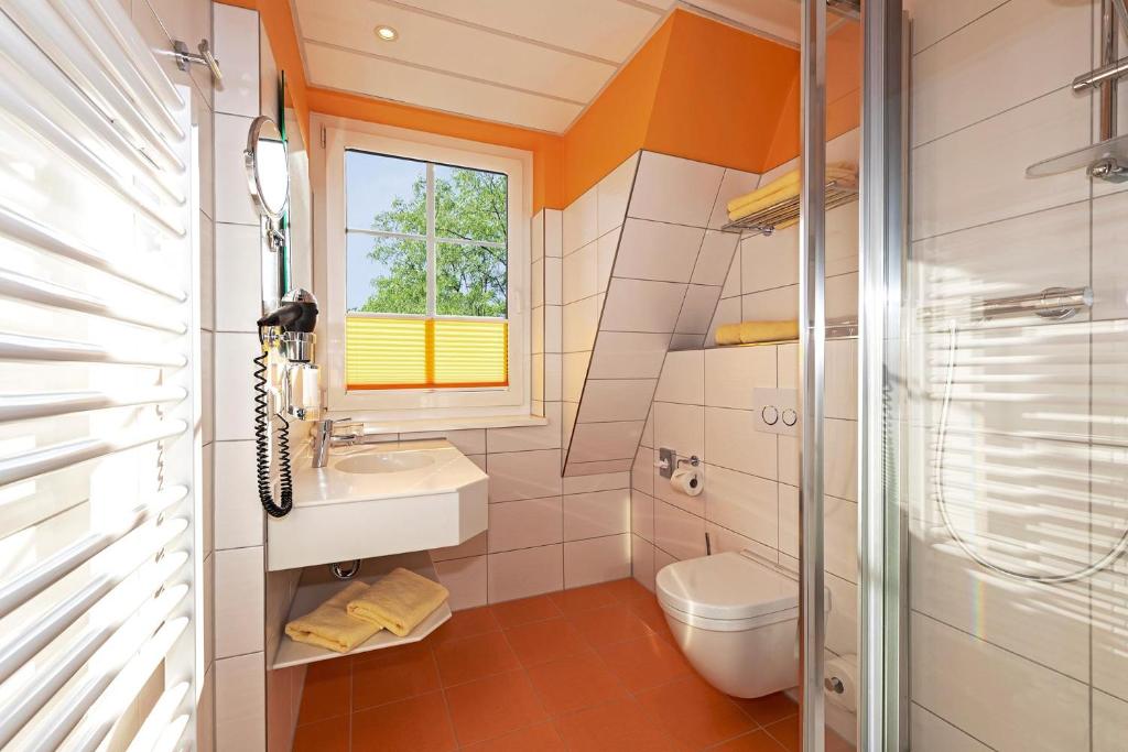 Koupelna v ubytování Dünenhotel am Meer