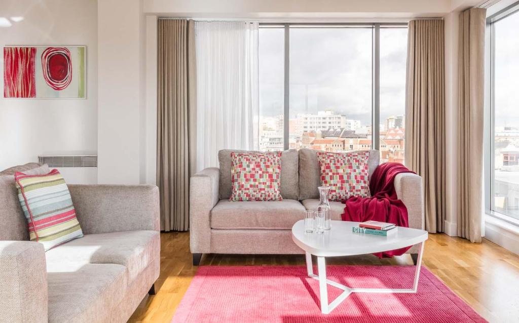 a living room filled with furniture and a window at SACO Bristol - Broad Quay in Bristol