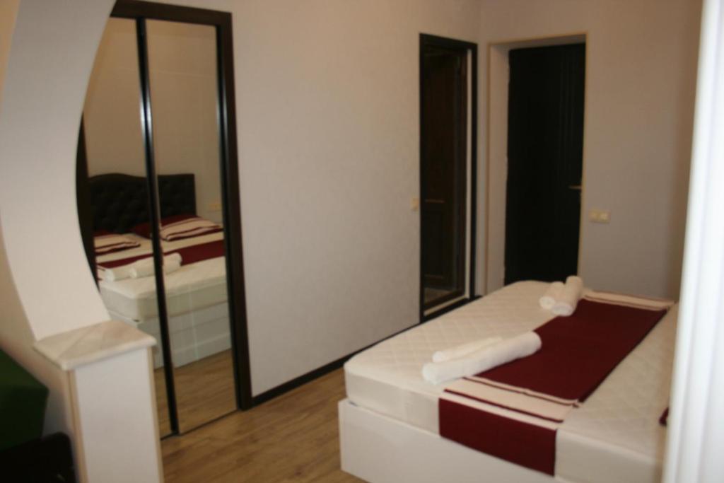 Postel nebo postele na pokoji v ubytování Guest house Medea