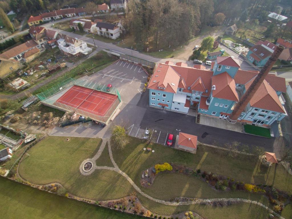 an aerial view of a house with a red roof at Penzion Lihovar *** in Rouchovany