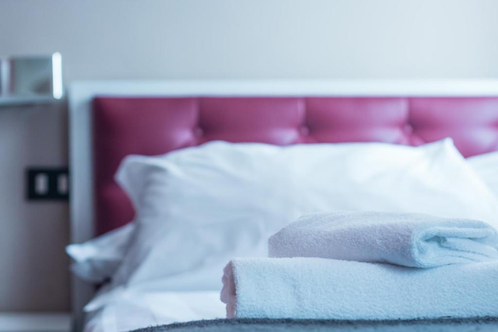 Postel nebo postele na pokoji v ubytování Hotel Cannaregio 2357