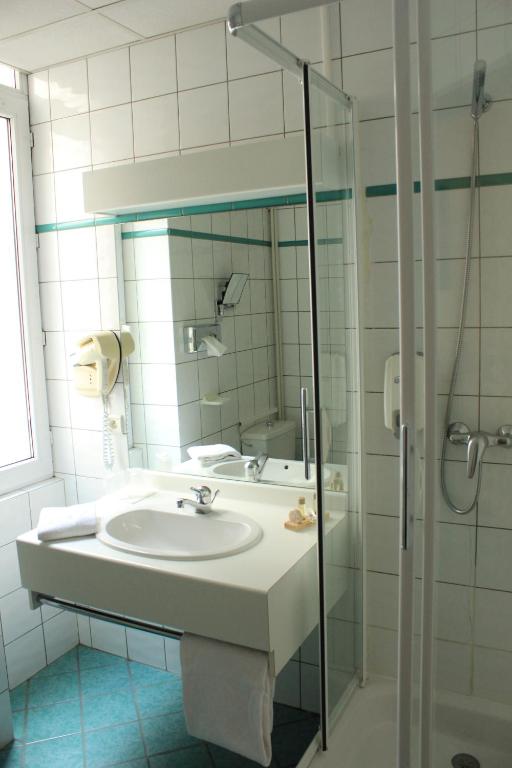 Koupelna v ubytování Hôtel Foch