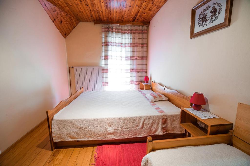 Postel nebo postele na pokoji v ubytování Farm Stay Žagar