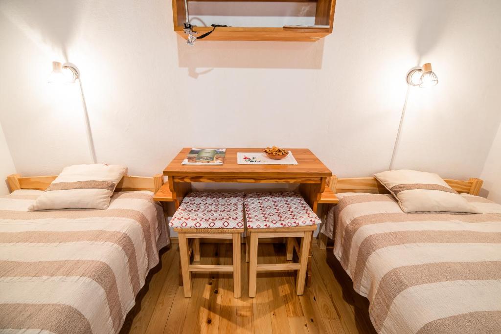 Postel nebo postele na pokoji v ubytování Farm Stay Žagar