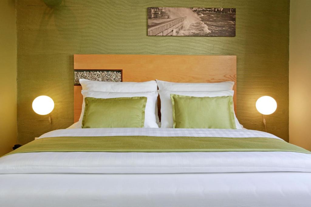 Voodi või voodid majutusasutuse Boutique Hotel Bol toas