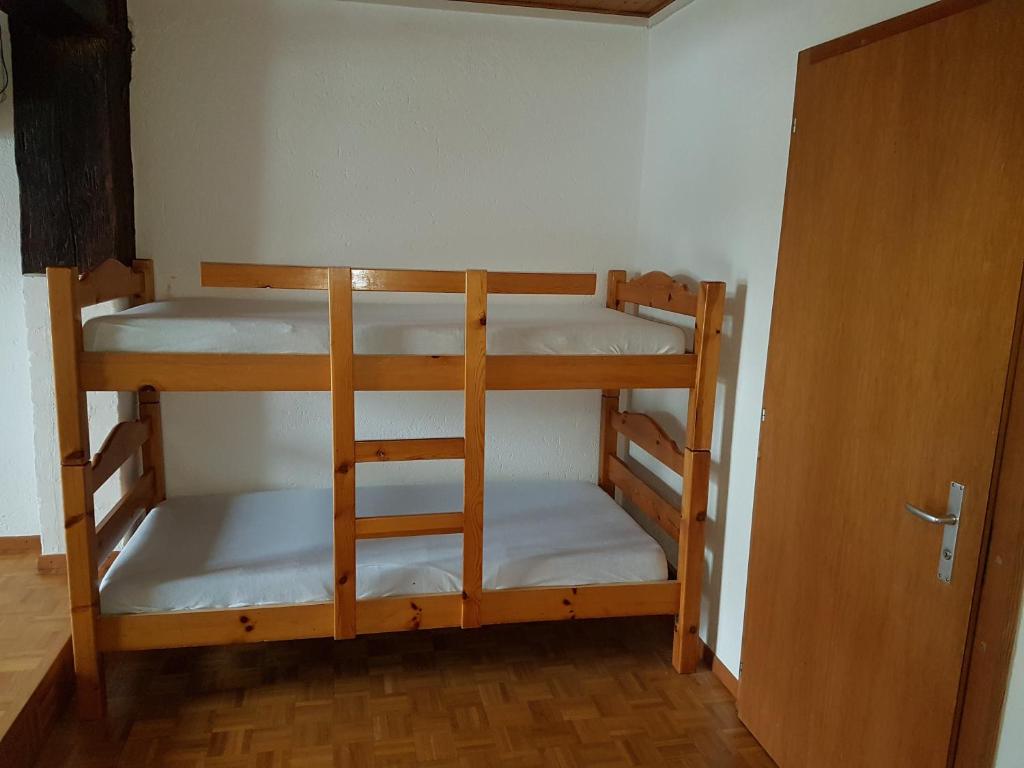Postel nebo postele na pokoji v ubytování Auberge de la Couronne