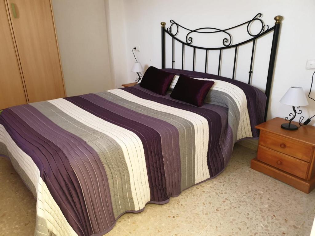 Postel nebo postele na pokoji v ubytování Hostal Gutierrez