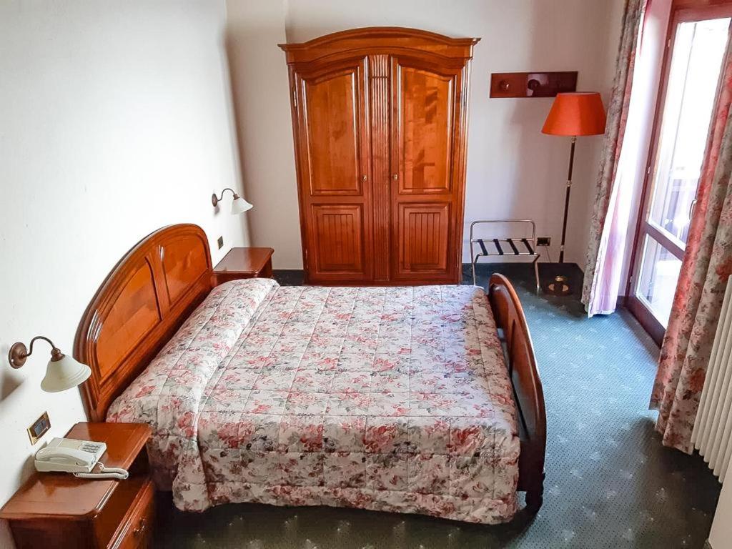 Postel nebo postele na pokoji v ubytování Hotel Panoramique