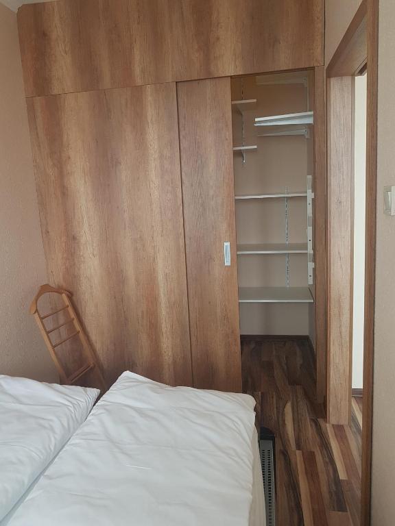 Posteľ alebo postele v izbe v ubytovaní Vegas Zugló
