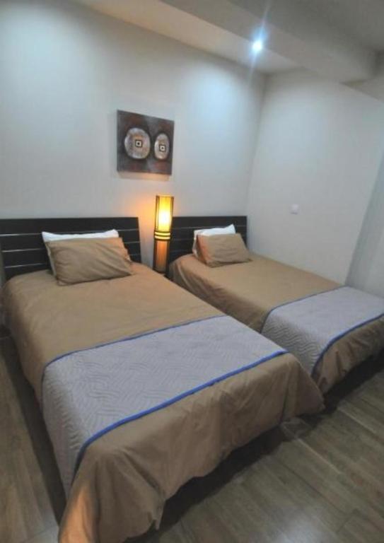 Postel nebo postele na pokoji v ubytování Ithaki Phinikoudes Apartment No. 105