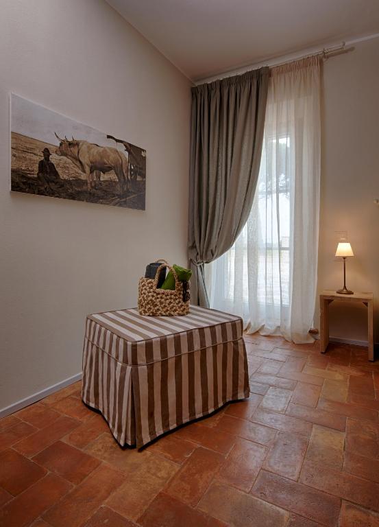 Postel nebo postele na pokoji v ubytování Agriturismo Poderedodici