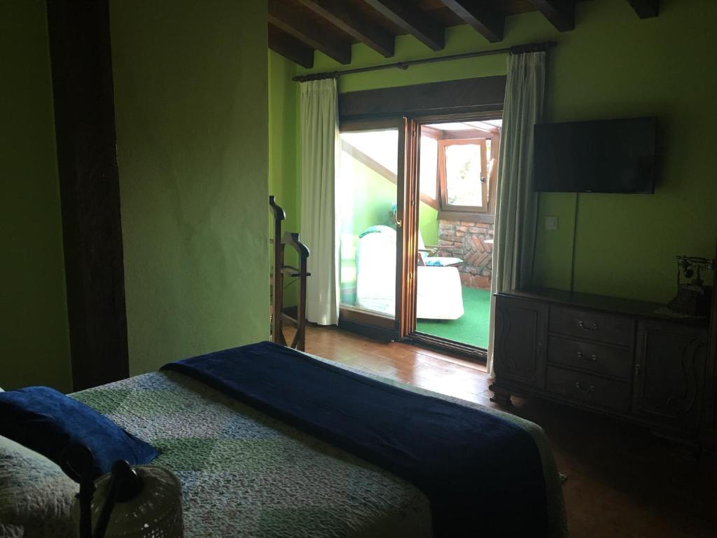 Posteľ alebo postele v izbe v ubytovaní Hotel Rural Posada El Trenti de Corona