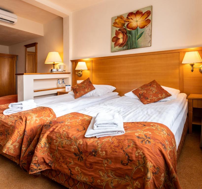 Postel nebo postele na pokoji v ubytování Eco Active Resort PIENINY