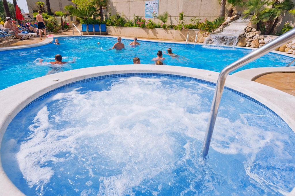 Bazén v ubytování Hotel Oasis Park Splash nebo v jeho okolí