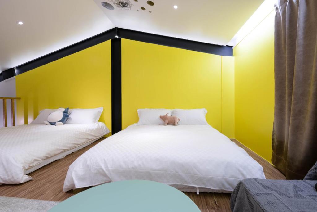 Postel nebo postele na pokoji v ubytování One Attic B&B