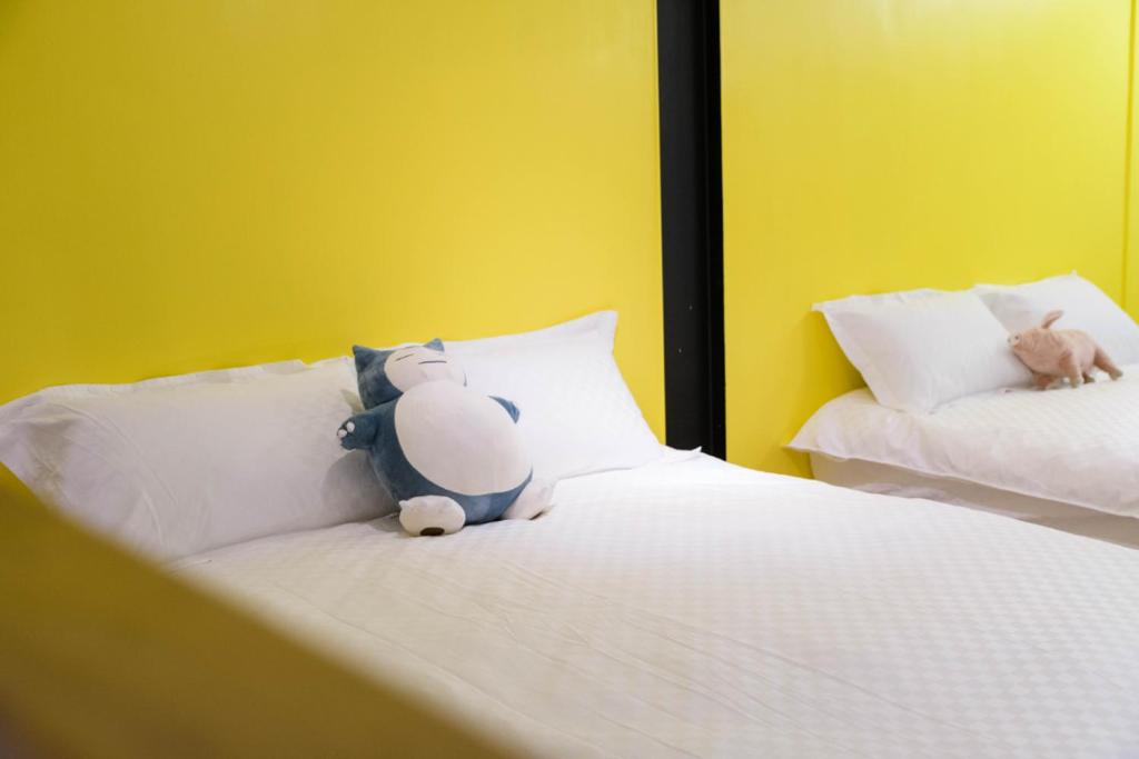 Postel nebo postele na pokoji v ubytování One Attic B&B