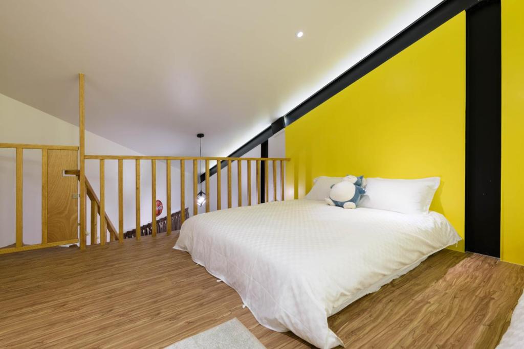 Postel nebo postele na pokoji v ubytování One Attic B&B