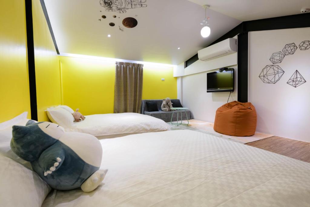 Postel nebo postele na pokoji v ubytování One Attic B&B
