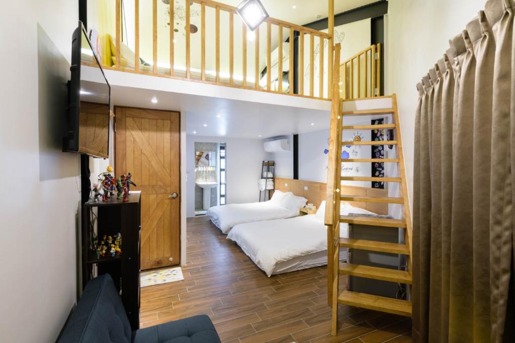 Postel nebo postele na pokoji v ubytování One Attic B&B