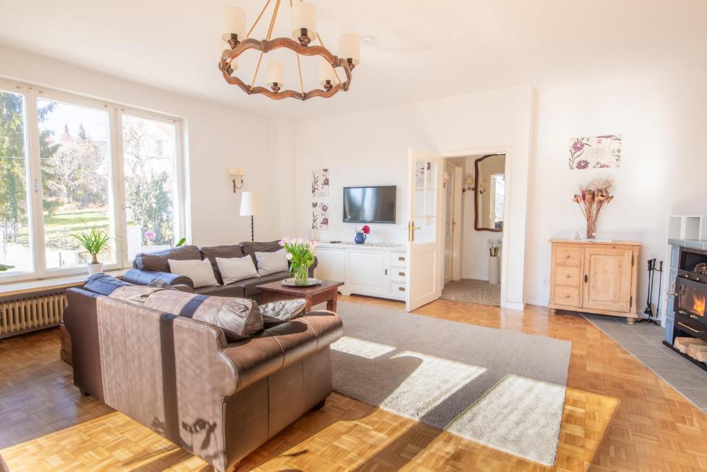 Televízia a/alebo spoločenská miestnosť v ubytovaní White Villa