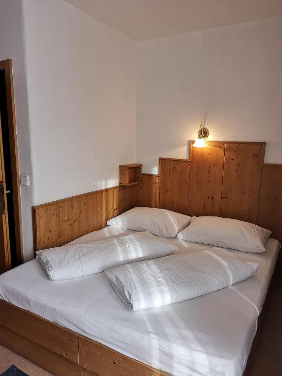 Postel nebo postele na pokoji v ubytování appartementsKOFLER