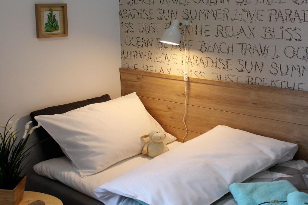 Posteľ alebo postele v izbe v ubytovaní Apartament Comfort