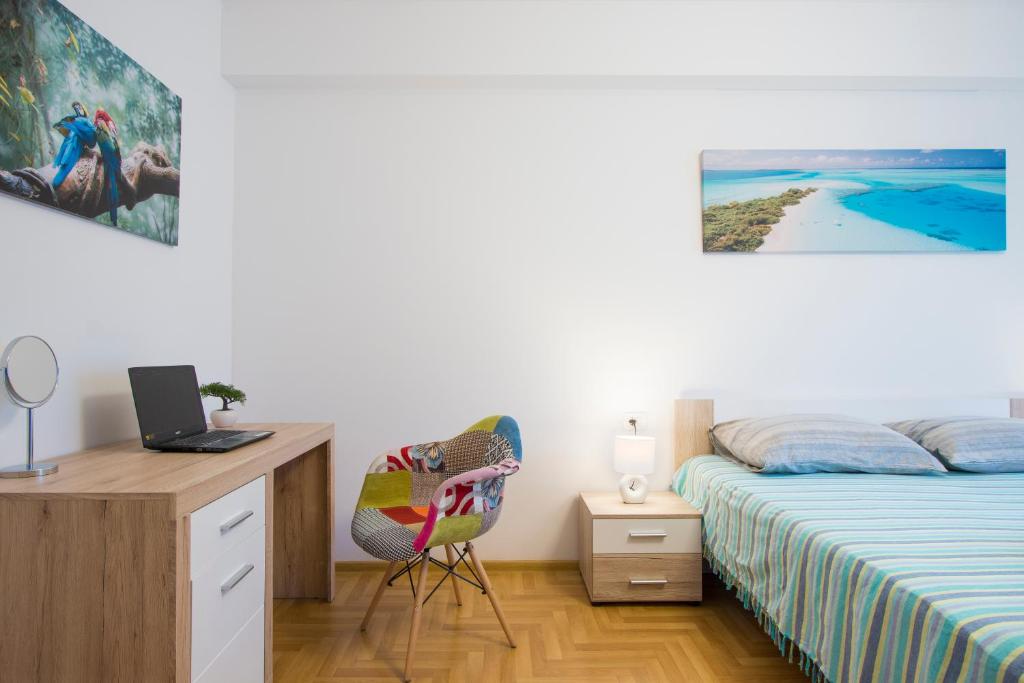 Łóżko lub łóżka w pokoju w obiekcie Apartment Rnjak