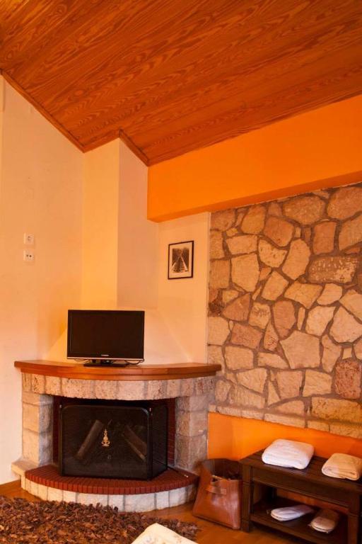 TV a/nebo společenská místnost v ubytování Hotel Kynaitha