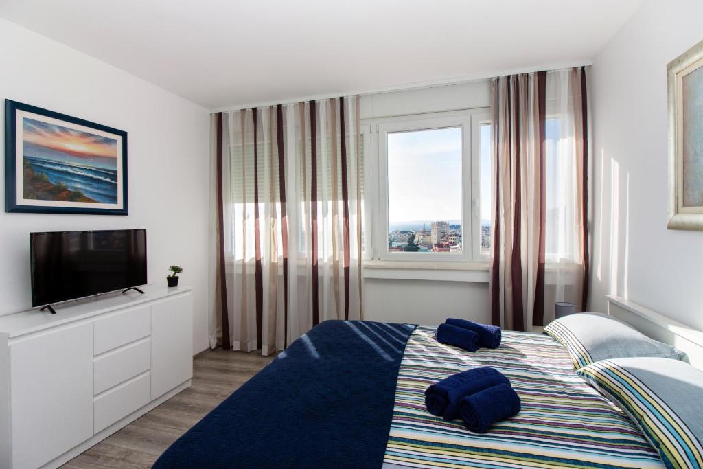 Posteľ alebo postele v izbe v ubytovaní Deluxe Apartment Miro
