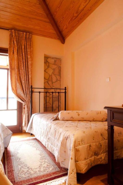 Postel nebo postele na pokoji v ubytování Hotel Kynaitha