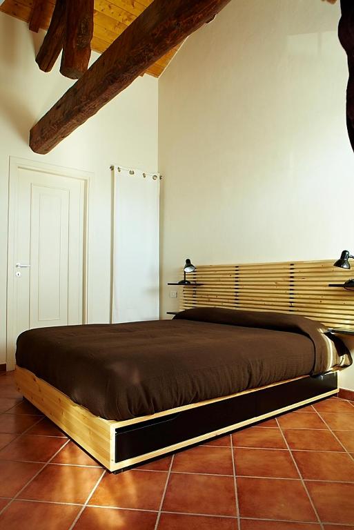 Postel nebo postele na pokoji v ubytování Agriturismo Vignarello