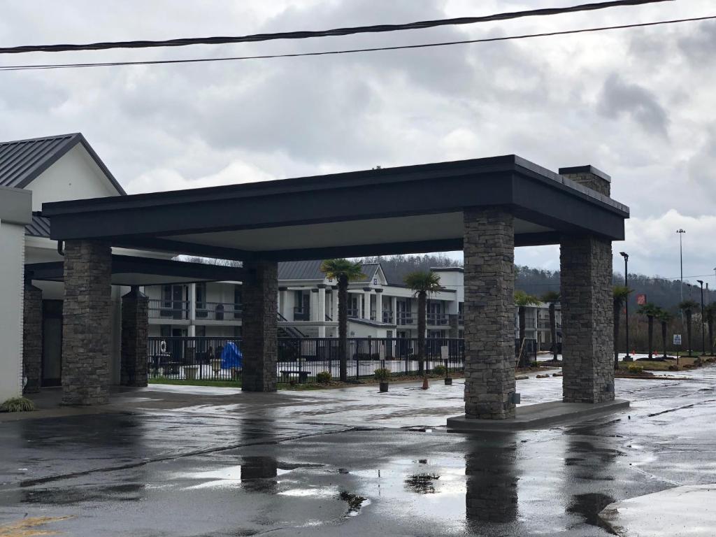 a pavilion in a parking lot in a city at Quality Inn in Dalton