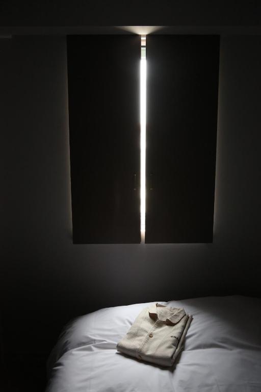 Llit o llits en una habitació de Excel Inn Nagoya Atsuta