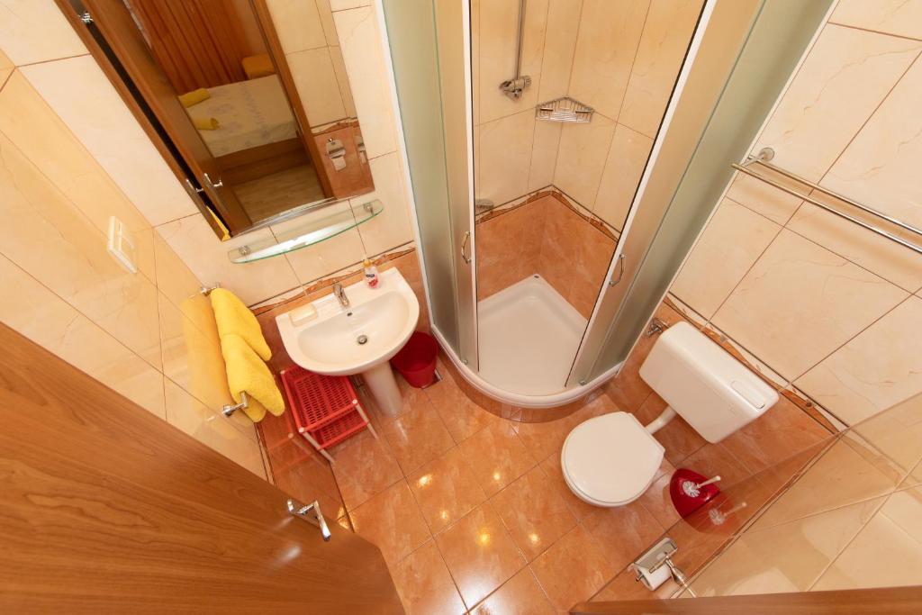 Kúpeľňa v ubytovaní Apartment Tino