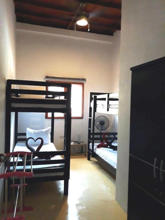 Postel nebo postele na pokoji v ubytování Pulau Weh Paradise