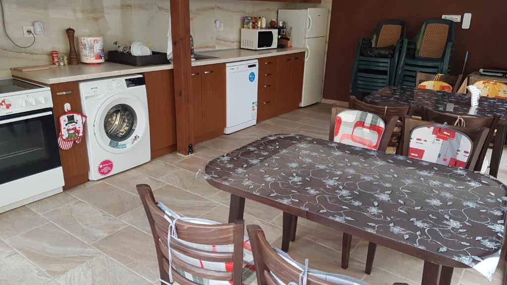 Kuchyň nebo kuchyňský kout v ubytování MARIANA - guest rooms