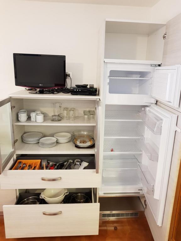 Kuchyň nebo kuchyňský kout v ubytování Residence La Zondra