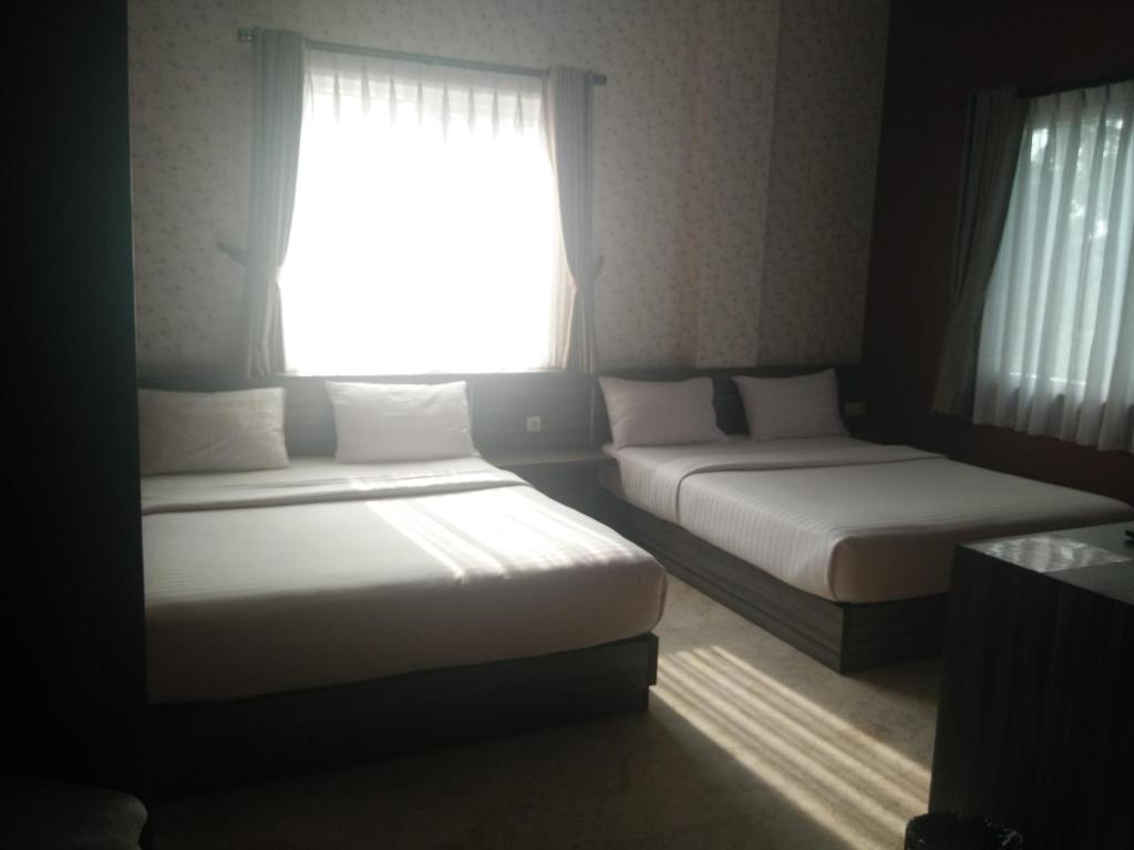 Tulip Guest House - Deluxe Queen Room